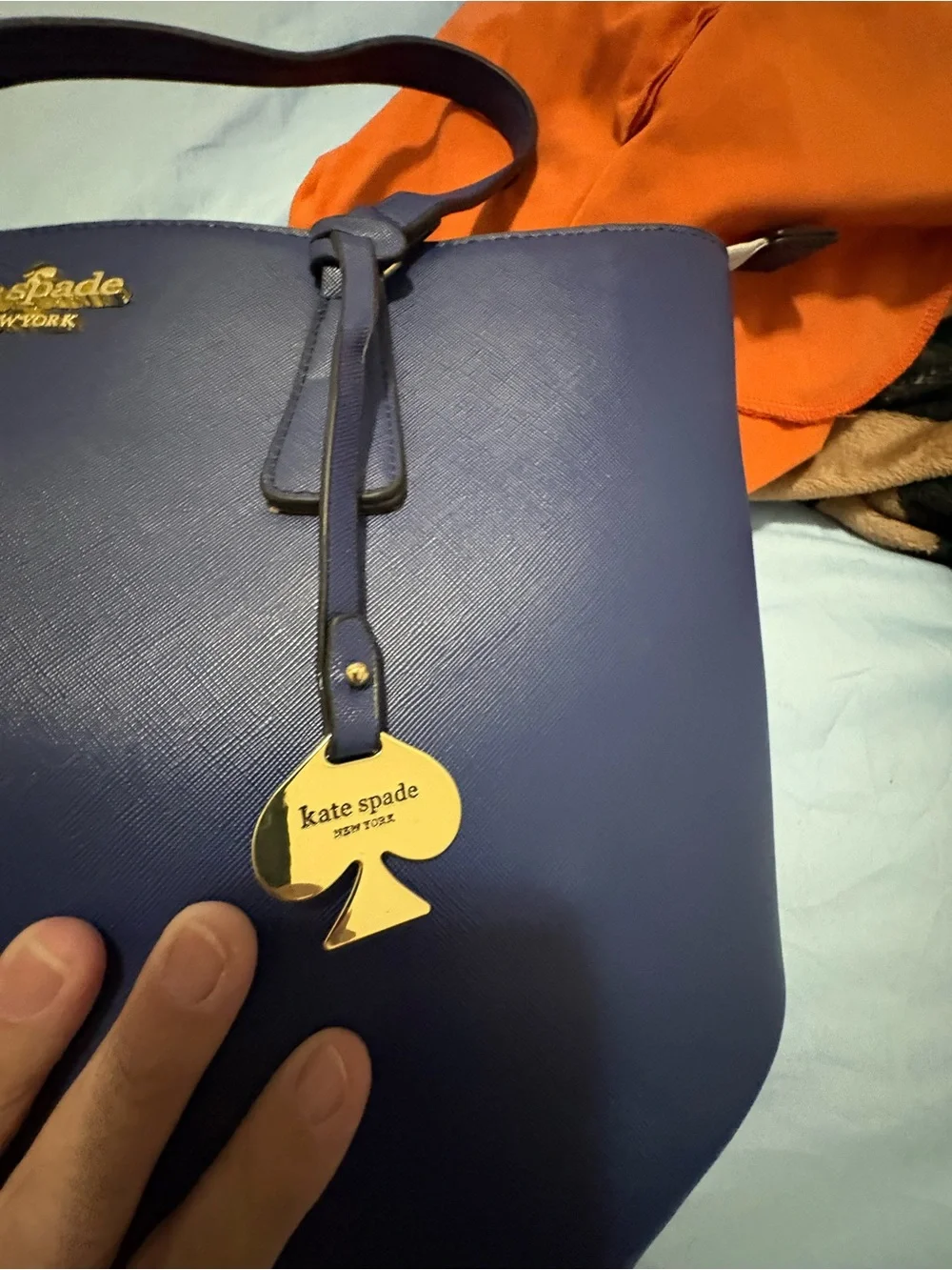 Structured Navy Fashion Tote with Gold Chain Accent and Wallet.